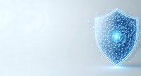 Digital shield with glowing blue hexagonal network pattern and central light, representing cybersecurity, data protection, and secure technology systems.