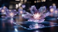 Glowing translucent cherry blossom floating on rippling water surface with bokeh lights in background creates magical atmospheric scene in purple and blue tones.