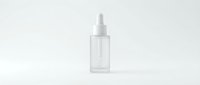 Clear glass dropper bottle with white pipette cap isolated on white background for cosmetic and skincare product packaging design.