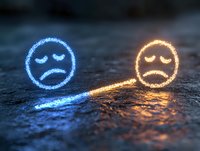 Glowing sad emoji faces on wet surface, blue and orange neon light effect creating emotional mood reflection. Concept for depression, loneliness and mental health.