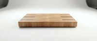 Wooden cutting board with end grain pattern on white background, isolated for kitchen product design and culinary content.
