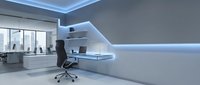 Modern minimalist office interior with floating white desk, ergonomic chair and LED strip lighting. Contemporary workspace design for productivity and focus.