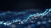 Abstract blue digital network with glowing dots and flowing lines on dark background for technology presentations and modern business concepts.