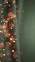 Abstract bokeh lights background with golden particles and green gradient for elegant design projects and festive celebrations.