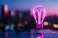 Glowing pink neon light bulb floating above reflective surface against blurred city skyline at dusk, creative innovation concept with modern aesthetic.