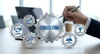 Business consultant analyzing strategy with interconnected gears showing consulting services, teamwork and professional development in modern office.