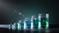 Glasses filled with clear and turquoise liquid arranged in ascending order on reflective surface with bokeh lights, suitable for science, chemistry, laboratory, and research concepts.