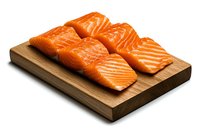 Fresh raw salmon fillets with distinctive orange color and marble texture arranged on wooden cutting board, isolated on white background for food photography.