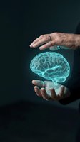 Male hands protecting glowing digital brain hologram representing mental health care, artificial intelligence and neurological protection concepts.