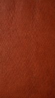 Terracotta leather texture with fine grain pattern, suitable for upholstery, fashion design, and interior decoration projects.