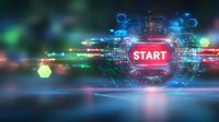 Glowing red start button with futuristic HUD interface elements and colorful light trails against dark background, digital technology concept for gaming or software.
