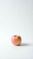 Fresh red apple isolated on white background for healthy eating and nutrition concepts.