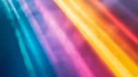 Vibrant diagonal light beams in turquoise, purple, yellow and red colors create dynamic abstract background with soft bokeh effect and glowing particles.