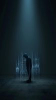 Silhouetted male figure in dark business suit standing amid glowing holographic skyscraper wireframes in moody, dimly lit environment. Suitable for corporate technology, digital transformation, and futuristic business concepts.