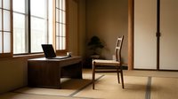 Minimalist Japanese-style home office with wooden desk, laptop, chair and natural lighting creating serene workspace atmosphere for productivity and focus.