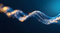 Glowing fiber optic wave with golden bokeh lights on dark blue background creates modern technology and communication concept for business designs.