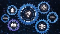 Blue mechanical gears with business icons including lightbulb, chess piece, and compass on dark digital background for corporate strategy concepts.