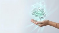 Hand holding holographic brain with digital data streams representing artificial intelligence and machine learning technology concepts.