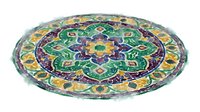Ornate mandala with intricate geometric patterns in green, purple, and gold tones, featuring symmetrical floral motifs and decorative elements for meditation and spiritual design projects.