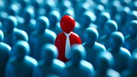 Red figure with white tie stands out among blue crowd, leadership concept showing individuality and uniqueness against conformity background.