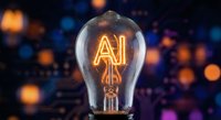 Glowing AI letters inside vintage light bulb with warm bokeh background representing artificial intelligence innovation and creative technology solutions.