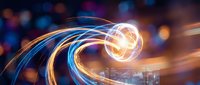 Abstract light trails with glowing orb creating dynamic energy flow against blurred cityscape background for technology and innovation concepts.