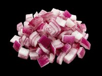 Diced red onion pile isolated on transparent background, ready for food design, recipe cards, restaurant menus, stickers, print on demand, and culinary clipart use.