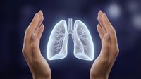 Protective hands surrounding transparent lungs with bronchial tree on dark background. Healthcare and respiratory system protection concept.