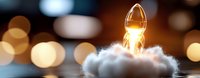 Glowing light bulb on fluffy cotton cloud with warm bokeh background creates magical atmosphere. Concept of innovation, creativity and bright ideas.