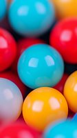 Colorful gumball candy macro shot with vibrant red, turquoise, yellow, and white spheres creating playful composition for food advertising.