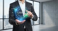 Professional businessman in dark suit presenting glowing digital hologram with data analytics and futuristic interface in modern office environment.