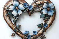 Rustic wooden heart wreath adorned with delicate blue dogwood flowers and green leaves on white background, romantic farmhouse decor element.