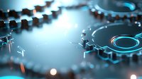 Futuristic mechanical gears with glowing blue light effects against dark background create dynamic technological composition for business and innovation concepts.