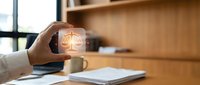 Businesswoman holding glowing scales of justice symbol, representing legal compliance, ethics, and fair business practices in corporate environment.