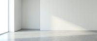 Empty minimalist room with white walls and polished concrete floor, soft natural light from window creating subtle shadows for modern interior design.
