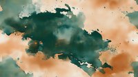 Watercolor ink wash with teal and orange tones creating abstract flowing shapes, suitable for backgrounds, wallpapers, and creative design projects.
