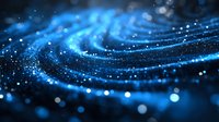 Glowing blue particles forming dynamic wave pattern on dark background with bokeh effect and depth of field, abstract digital technology concept.