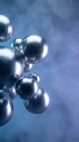 Metallic chrome spheres floating in blue space with reflective surfaces and modern lighting effects for technology and science concepts.