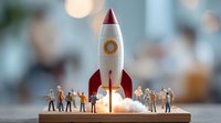 Miniature people watching rocket launch on wooden platform with smoke effect and bokeh background, business startup concept and teamwork metaphor.