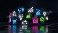 Digital marketing concept with glowing neon business icons floating above reflective surface. Professional woman silhouette observing analytics symbols.