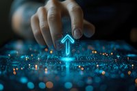 Glowing blue holographic arrow pointing upward with hand gesture interaction on dark background with bokeh light effects and digital particles.