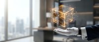 Businessman hand presenting glowing digital cube with geometric wireframe structure in modern office environment for technology and innovation concepts.