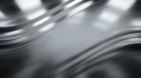 Abstract silver metallic surface with flowing curved lines and motion blur effects creating dynamic waves and reflections for modern design backgrounds.