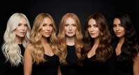 Five diverse women with different hair colors and styles wearing black outfits against dark background for beauty salon marketing and hair styling concepts.