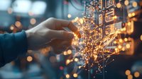 Glowing digital network connections with hand touching illuminated data points against blurred bokeh background, representing technological advancement.