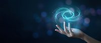Hand holding glowing cyan spiral energy vortex with bokeh lights on dark background. Futuristic technology concept for innovation, digital transformation, and creative solutions.