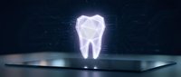 Futuristic holographic tooth projection on digital tablet screen with glowing neon light effect for dental technology and healthcare innovation concepts.