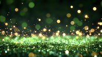 Magical green and gold bokeh background with glowing sparkles and defocused lights creating dreamy abstract pattern for festive designs and holiday layouts.