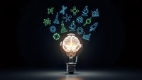 Glowing light bulb with brain inside surrounded by floating science and technology icons on dark background for innovation and creativity concepts.