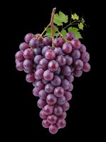 Fresh red grape bunch with green leaf, isolated on transparent background. Ready for stickers, print on demand, sublimation, T-shirt design, and clipart use.